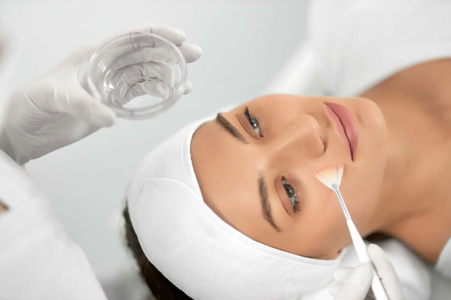 young-woman-doing-procedure-face-beautician-chemical-peel